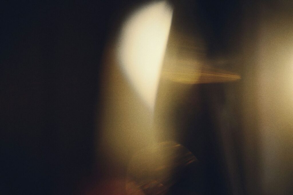 Abstract light emerging from darkness